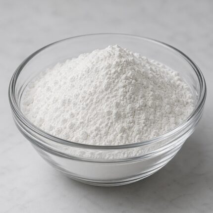 Sodium Hyaluronate powder fine white powder in a glass bowl used for hydration and anti-aging skincare formulations.