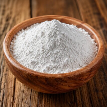 Acrylates/C10-30 Alkyl Acrylate Crosspolymer fine white powder in a glass container used as a thickening and stabilizing agent in cosmetic formulations.