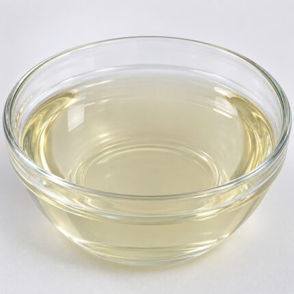 Euxyl K 712 clear to slightly yellow liquid in glass container used as preservative system in cosmetic formulations
