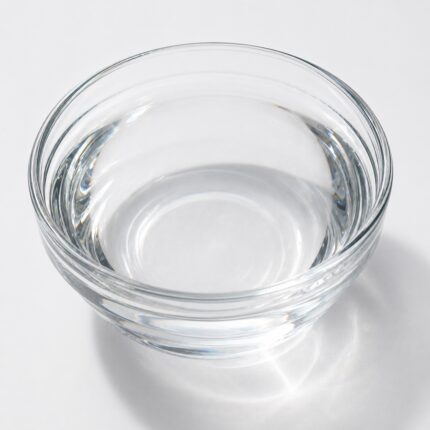 Optiphen Plus clear preservative liquid in glass container for cosmetic formulations