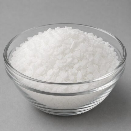 Stearic Acid white waxy flakes used as an emulsifier and thickening agent in cosmetic formulations.