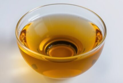 Polysorbate 80 viscous yellow liquid used as a nonionic emulsifier and solubilizer in cosmetic formulations.
