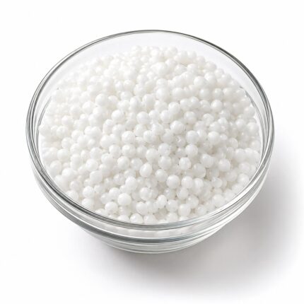 White waxy flakes of BTMS 25 (Behentrimonium Methosulfate blend) in a glass bowl, used as a conditioning emulsifier in hair and skincare formulations.
