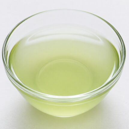 Clear to slightly hazy liquid of Anagain in a glass container, smooth texture and cosmetic-grade appearance.