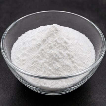 Hydrolyzed silk protein powder in a glass container, showing its fine white to off-white texture.