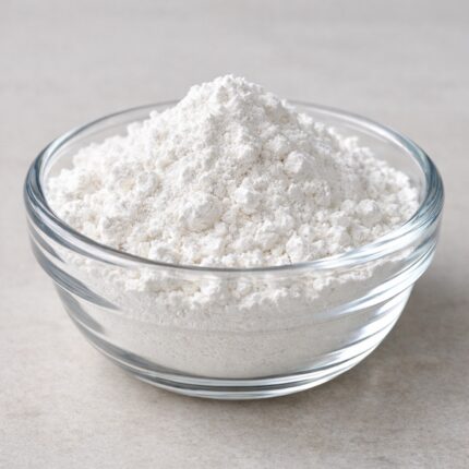 Micronized zinc oxide fine white powder in glass bowl Ultra-fine zinc oxide powder with smooth texture for skincare Cosmetic grade micronized zinc oxide powder close-up High purity micronized zinc oxide in clear glass container Soft white zinc oxide microfine powder for sunscreen use Fine particle zinc oxide powder for UV protection formulations Micronized zinc oxide with uniform texture for cosmetic applications