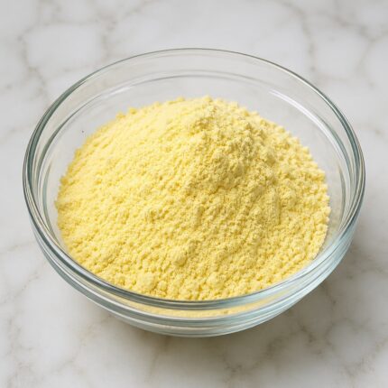 Fine off-white powder of Pea peptide in a glass bowl, smooth texture and cosmetic-grade appearance.