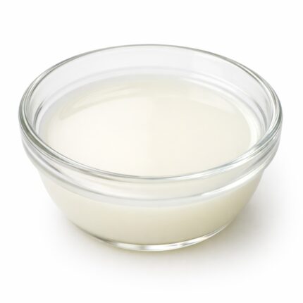 Simethicone clear, viscous liquid in a glass container, used in pharmaceutical and personal care formulations for its anti-foaming and gas-relief properties.