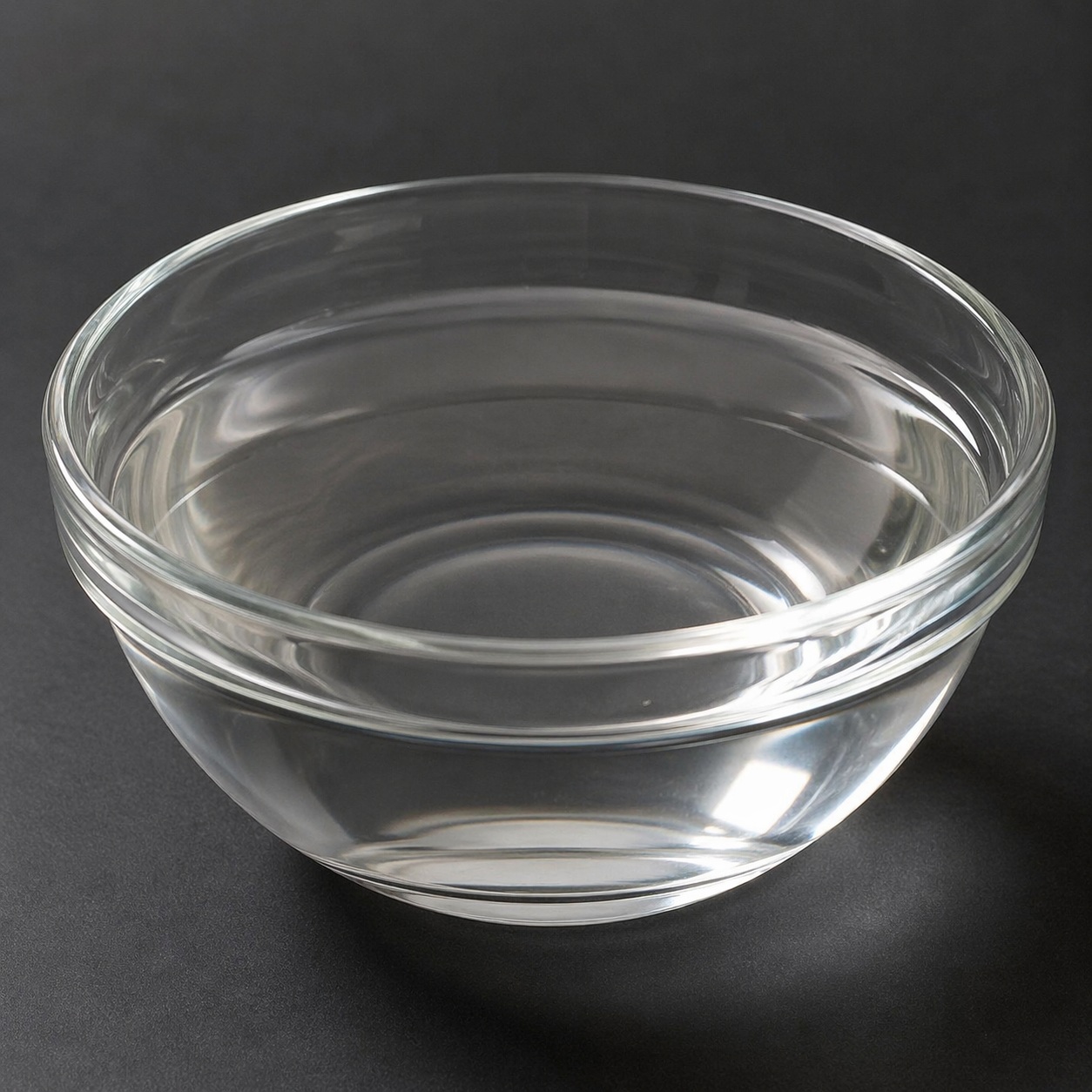 Sorbitol Clear, viscous liquid of Sorbitol in a glass container, smooth texture and colorless appearance suitable for cosmetic and food use.