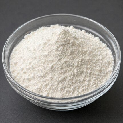 Fine white crystalline powder of Urea (IP grade) in a glass bowl, smooth texture and pharmaceutical-grade appearance.