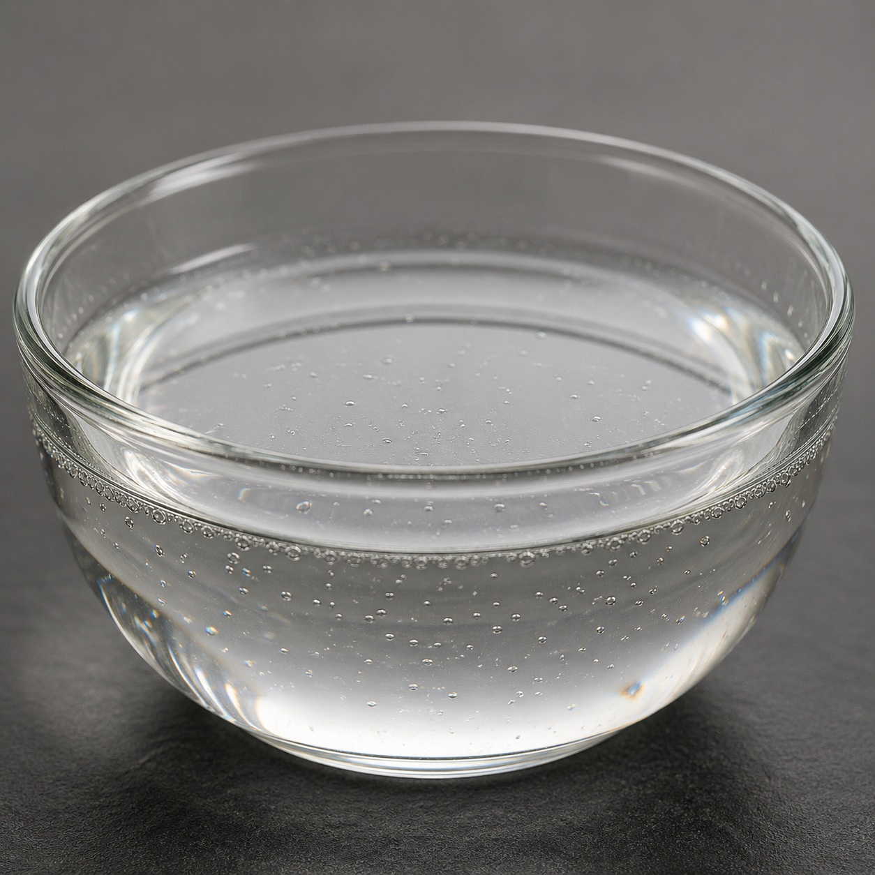 Xylishine Liquid Clear to slightly hazy liquid of Xylishine in a glass container, smooth texture and glossy appearance.